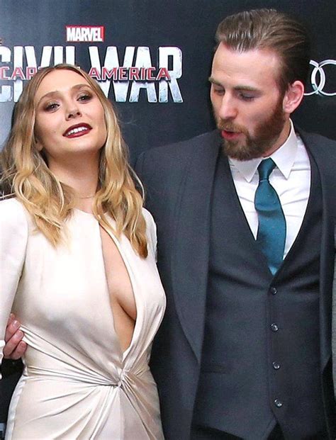 elizabeth olsen boobs|Why Chris Evans Was Really Staring at Elizabeth Olsens Cleavage